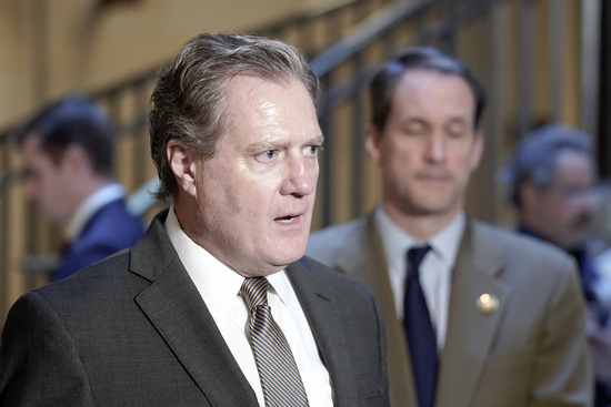 FILE - House Intelligence Chair Mike Turner, R-Ohio, left, speaks with reporters on Capitol Hill in Washington, Feb. 15, 2024, as Rep. James Himes, D-Conn., right, listens. (AP Photo/Mariam Zuhaib, File)