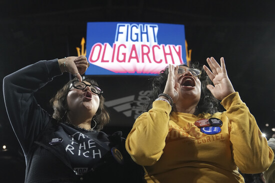 People cheer for Sen. Bernie Sanders, I-Vt., and Rep. Alexandria Ocasio-Cortez, D-N.Y., during a "Fighting Oligarchy" tour event at Arizona State University, Thursday, March 20, 2025, in Tempe, Ariz. (AP Photo/Ross D. Franklin) People cheer for Sen. Bernie Sanders, I-Vt., and Rep. Alexandria Ocasio-Cortez, D-N.Y., during a "Fighting Oligarchy" tour event at Arizona State University, Thursday, March 20, 2025, in Tempe, Ariz. (AP Photo/Ross D. Franklin)