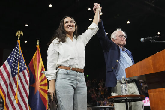 Sen. Bernie Sanders, I-Vt., and Rep. Alexandria Ocasio-Cortez, D-N.Y., greet the crowd together during a "Fighting Oligarchy" tour event at Arizona State University, Thursday, March 20, 2025, in Tempe, Ariz. (AP Photo/Ross D. Franklin) Sen. Bernie Sanders, I-Vt., and Rep. Alexandria Ocasio-Cortez, D-N.Y., greet the crowd together during a "Fighting Oligarchy" tour event at Arizona State University, Thursday, March 20, 2025, in Tempe, Ariz. (AP Photo/Ross D. Franklin)