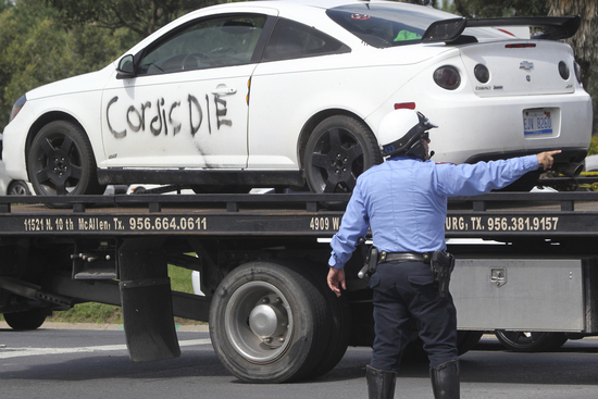 Vehicle belonging to suspect with the words "Cordis Die" written on its door is towed away from the scene at Rio Grande Valley Border Patrol Sector Annex, Monday, July 7, 2025, McAllen, Texas. (Delcia Lopez/The Monitor via AP) Vehicle belonging to suspect with the words "Cordis Die" written on its door is towed away from the scene at Rio Grande Valley Border Patrol Sector Annex, Monday, July 7, 2025, McAllen, Texas. (Delcia Lopez/The Monitor via AP)
