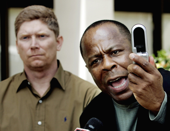 Attorney Leo Terrell, right, speaks during a news conference in Beverly Hills, Calif., Wednesday, April 20, 2005, as his client Steven Foerster looks on. Foerster says he was roughed up at a Glendale courthouse last October after he used his camera phone to take pictures of sheriff's deputies. A videotape released at the news conference shows sheriff's deputies throwing Foerster down on the ground and carrying him away. (AP Photo/Reed Saxon) Attorney Leo Terrell, right, speaks during a news conference in Beverly Hills, Calif., Wednesday, April 20, 2005, as his client Steven Foerster looks on. Foerster says he was roughed up at a Glendale courthouse last October after he used his camera phone to take pictures of sheriff's deputies. A videotape released at the news conference shows sheriff's deputies throwing Foerster down on the ground and carrying him away. (AP Photo/Reed Saxon)