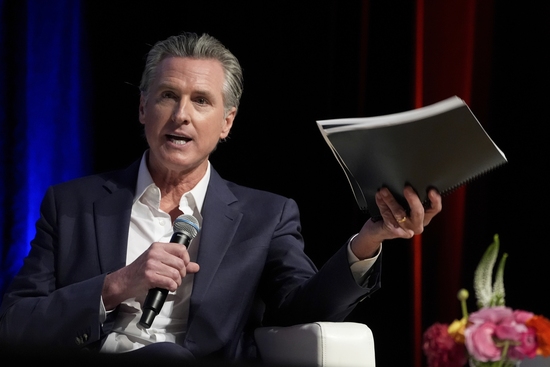 California Gov. Gavin Newsom holds a fireside chat with Stephen Cheung, the President and Chief Executive Officer of the Los Angeles County Economic Development Corporation (LAEDC) and its subsidiary, the World Trade Center Los Angeles (WTCLA) at the 2025 Economic Forecast and Industry Outlook convening on Wednesday, Feb. 26, 2025, at the East LA College in Los Angeles. (AP Photo/Damian Dovarganes) California Gov. Gavin Newsom holds a fireside chat with Stephen Cheung, the President and Chief Executive Officer of the Los Angeles County Economic Development Corporation (LAEDC) and its subsidiary, the World Trade Center Los Angeles (WTCLA) at the 2025 Economic Forecast and Industry Outlook convening on Wednesday, Feb. 26, 2025, at the East LA College in Los Angeles. (AP Photo/Damian Dovarganes)