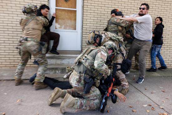 ICE agents detain a protester as other protesters try to stop them in East Side, Chicago, Tuesday, Oct. 14, 2025. (Anthony Vazquez/Chicago Sun-Times via AP) ICE agents detain a protester as other protesters try to stop them in East Side, Chicago, Tuesday, Oct. 14, 2025. (Anthony Vazquez/Chicago Sun-Times via AP)