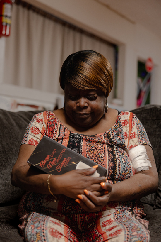 Pamela Walker poses for a portrait while holding her daughter, Tierra La’Nesa Walker’s, ashes, Saturday, Oct. 4, 2025, in San Antonio. ..Pamela Walker describes her daughter as her “best friend” and a woman whose “accomplishments amazed me.” Nickanmed Toi by friends and family, Tierra was there for all of her family members whenever they needed her. Her death shook everyone. ..(Lexi Parra for ProPublica)