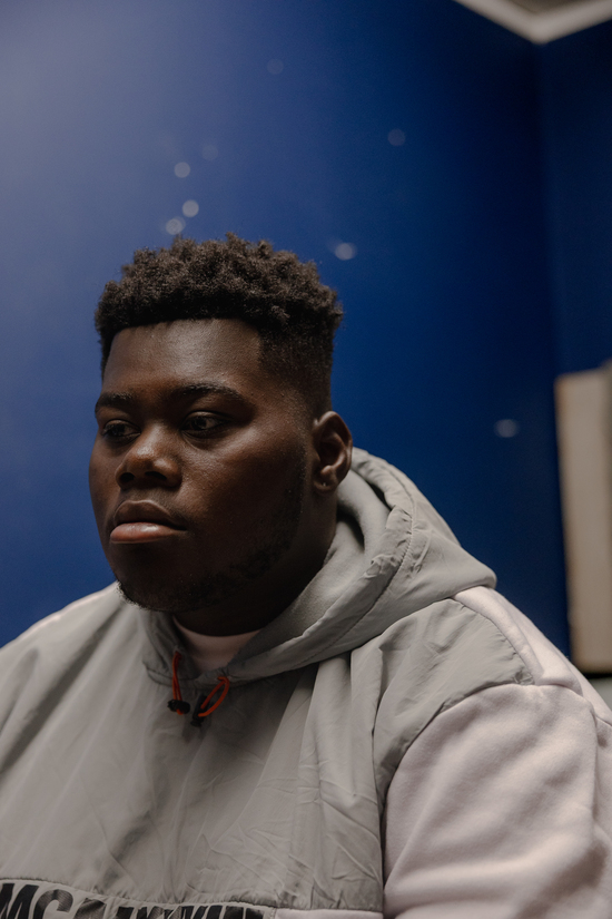 Javohn , “JJ,” Tierra’s son, poses for  a portrait in his room at his aunt’s property, Saturday, Oct. 4, 2025, in San Antonio. JJ likes to visit his late mom’s husband, Eric, at their mobile home and play with one of Tierra’s dogs. A reserved, respectful kid, all of Tierra’s family watches over JJ, helping him through his grief. ..(Lexi Parra for ProPublica)