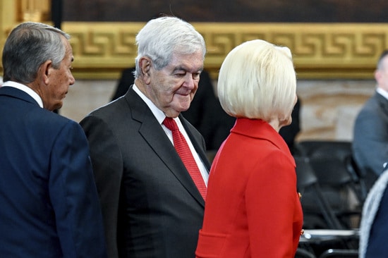 Newt Gingrich, center, his wife Callista Gingrich, right, and former House Speaker John Boehner arrive at the 60th Presidential Inauguration in the Rotunda of the U.S. Capitol in Washington, Monday, Jan. 20, 2025. (Kenny Holston/The New York Times via AP, Pool)